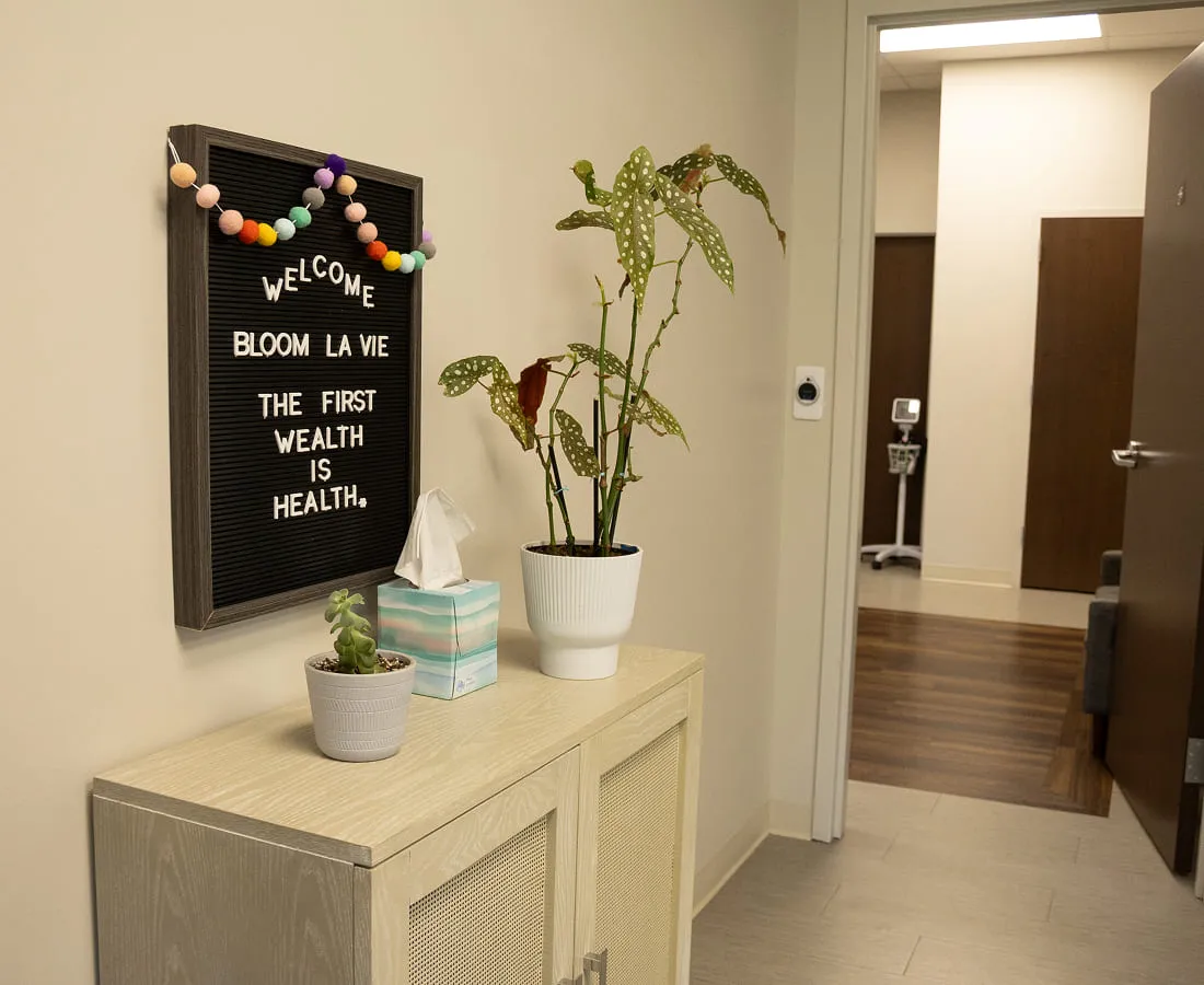 The welcome board inside the Bloom La Vie Health clinic in Kansas City