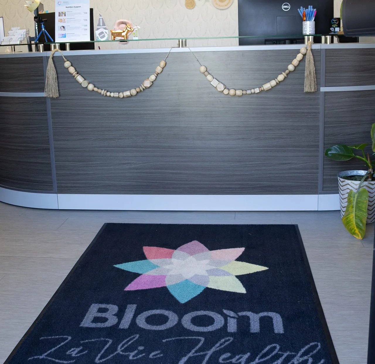 Dr. Nedeau with a patient at the Bloom La Vie Health clinic