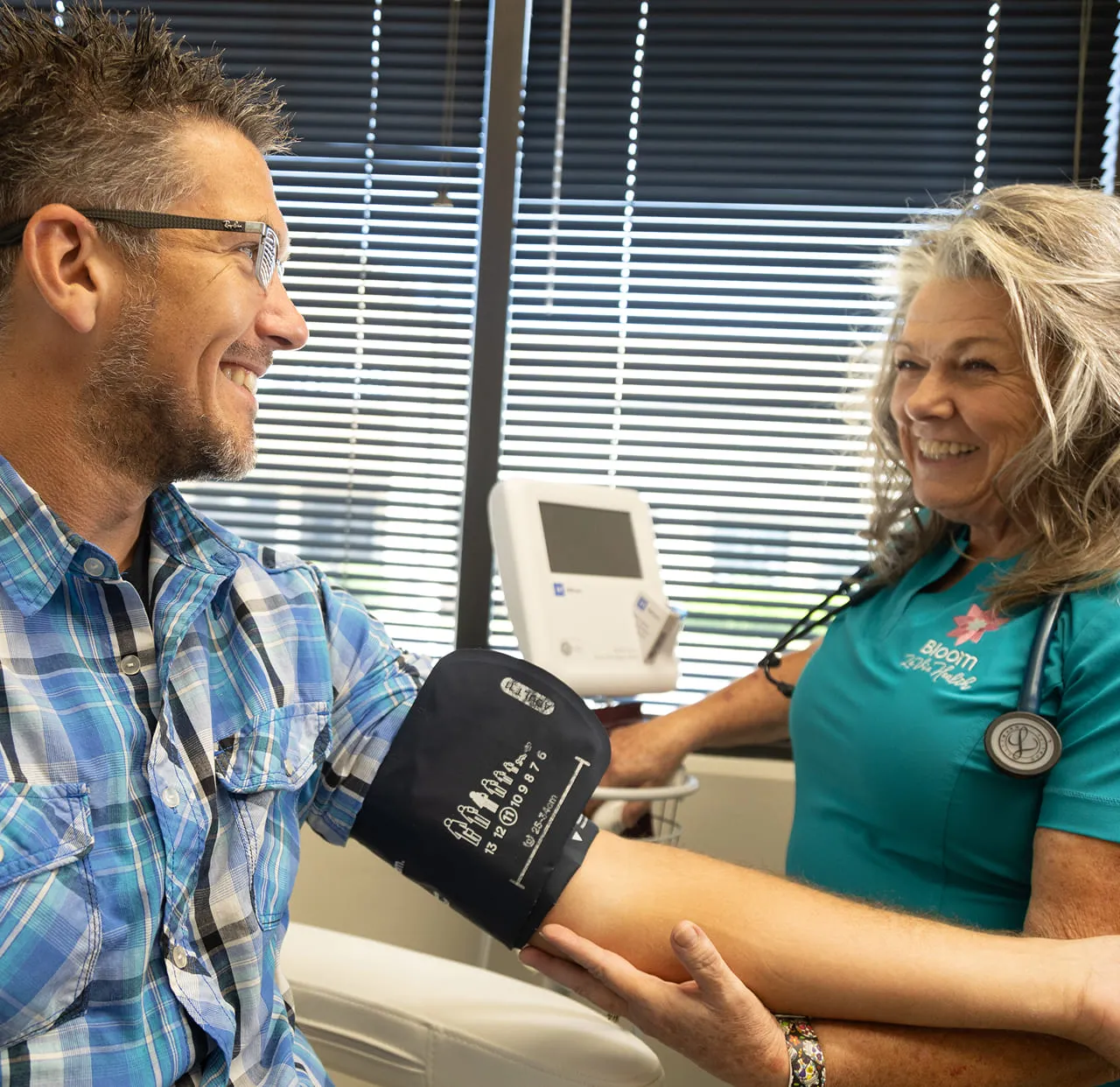 Dr. Nedeau greeting a patient in the Bloom La Vie Health clinic